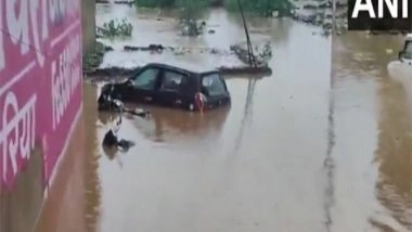 India News | Heavy Rainfall Triggers Severe Waterlogging in MP's Sheopur; Vehicles Submerged, Locals Affected