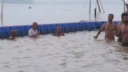 India News | Prayagraj: Devotees Take Holy Dip in Triveni Sangam on Devshayani Ekadashi