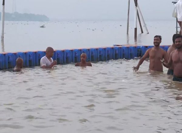 India News | Prayagraj: Devotees Take Holy Dip in Triveni Sangam on Devshayani Ekadashi