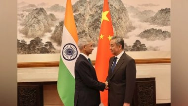 World News | Jaishankar, Wang Yi Review India-China Ties; Stress People-centric Steps and Border Stability