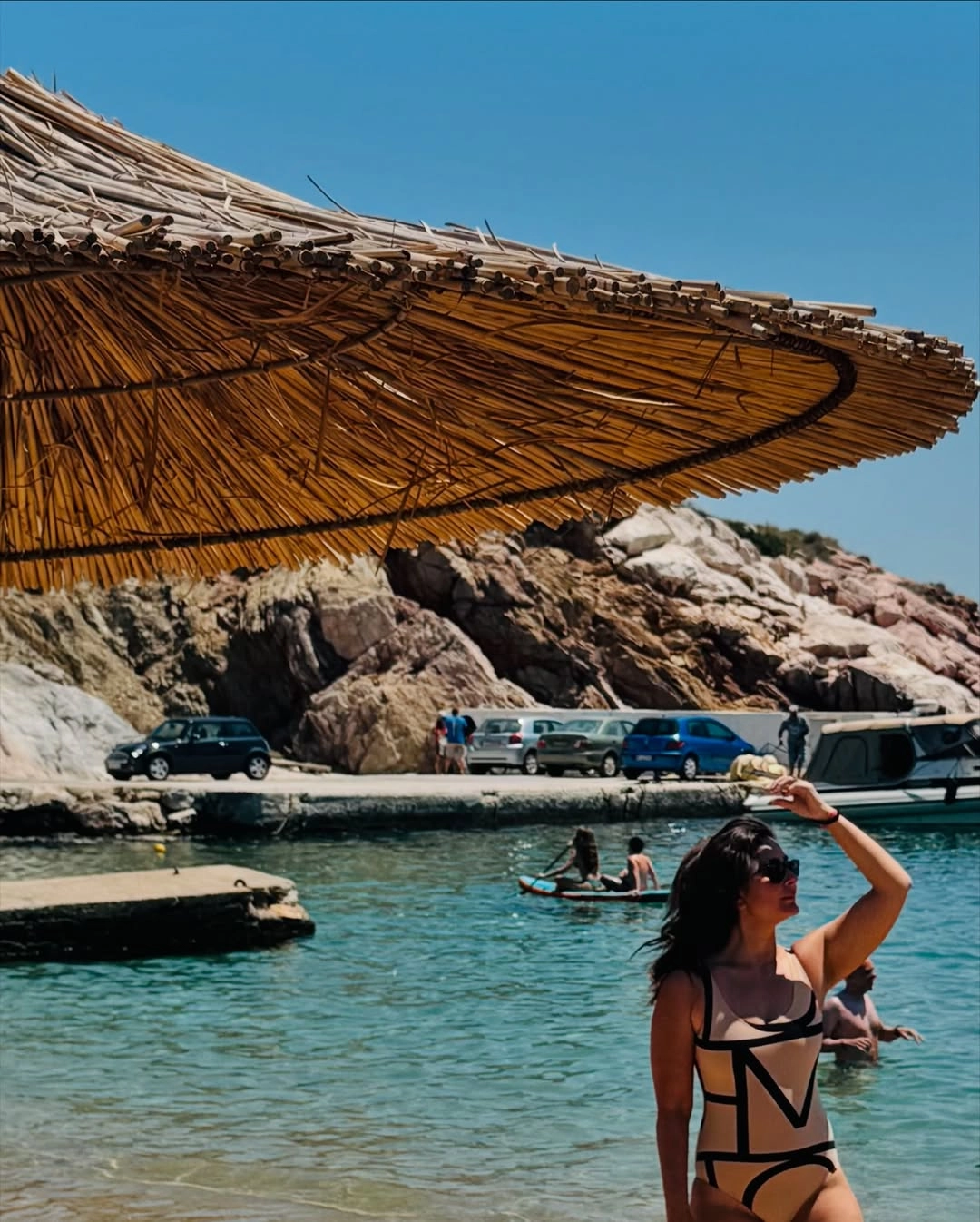 Kareena kept her beauty look clean and fresh, letting her natural glow and statement swimsuit do all the talking.