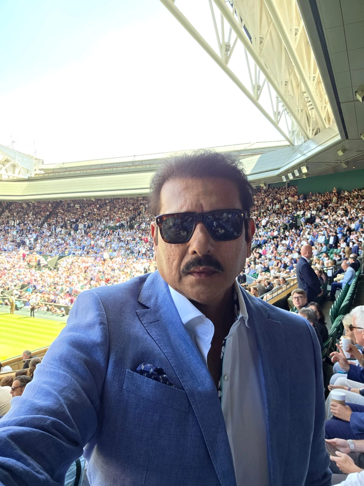 Former India Cricketer Ravi Shastri Seen Enjoying Wimbledon 2025