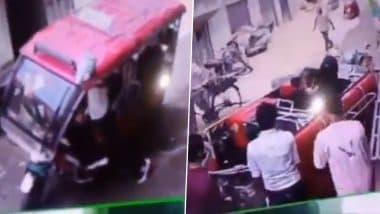Hapur: E-Rickshaw Carrying Passengers Overturns After Getting Stuck in Pothole in UP’s Majidpura Colony, CCTV Video Surfaces