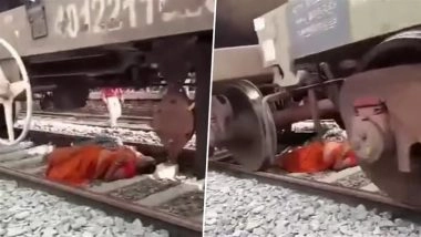 Shocking Escape Caught on Camera in Bihar: 2 Girls at Begusarai Railway Station Lie Flat on Tracks as Goods Train Passes Over Them, Eyewitnesses Scream in Panic, Video Surfaces