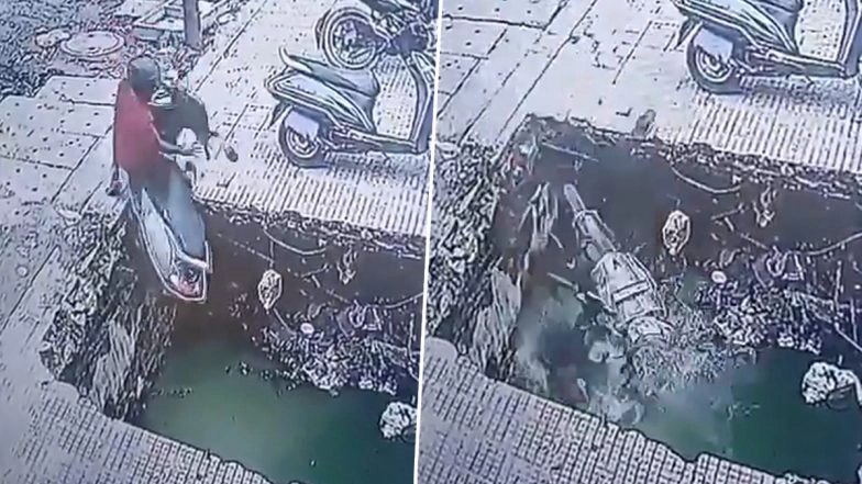 Ghaziabad: Narrow Escape for Man After Scooter Falls Into Open Drain Outside Gaur Green City Market, Dramatic CCTV Video Goes Viral