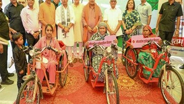 India News | Rajasthan CM Bhajanlal Sharma Distributes Motorised Tricycles to Specially-abled Girls, Women in Jamdoli