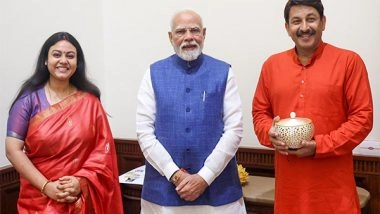 India News | BJP's Manoj Tiwari Presents PM Modi with Prasad Penda of Baba Baidhyanath Dham