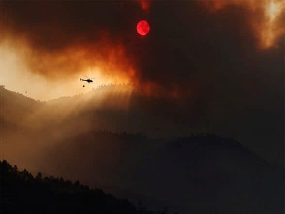 World News | Portugal Battles Three Major Blazes in Mountainous North, Forcing Evacuations, Challenging Firefighters