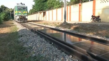 India News | Banaras Locomotive Works Installs India's First Removable Solar Panel System on Active Railway Tracks