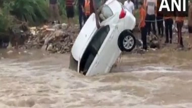 India News | J-K: Car Swept Away by Heavy Water Flow Rescued in Kathua