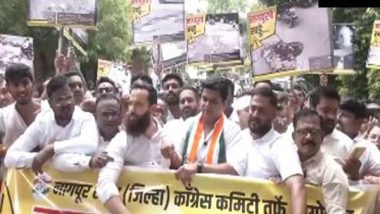 India News | Maharashtra: Congress Workers Protest in Nagpur over Potholes on City Roads