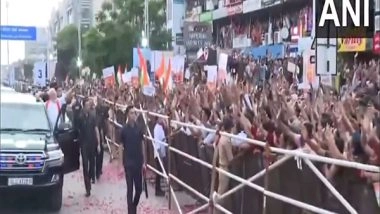 India News | PM Modi Holds Roadshow in Ahmedabad; to Inaugurate and Lay Foundation Stone for Projects Worth Rs 5,400 Crore