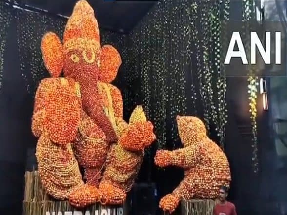 India News | Natraj Club Prepares 26-feet-tall Ganesh Statue with Apples in Odisha's Sambalpur