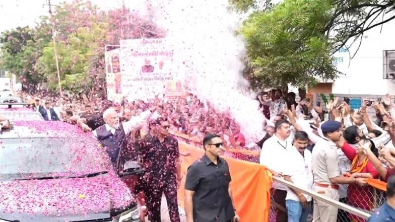 PM Narendra Modi Responds to Child’s Salute With Heartwarming Gesture During Roadshow in Gujarat’s Bhavnagar (Watch Video)