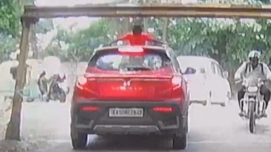 Bengaluru Horror: Boy Pops Head Out of Car Sunroof, Strikes Overhead Barrier in Shocking Video Showing Carefree Moment Turning into Dangerous Accident