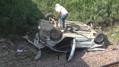 Delhi Road Accident: Driver Injured After Car Falls off Mukarba Chowk Flyover, Lands on Railway Tracks (Watch Video)