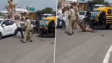 Raebareli: Cop Knocked To Ground After Man Punches Him Over Traffic Diversion in UP, Police Respond After Video Goes Viral