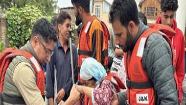 India News | J-K: Srinagar Police Leads Evacuation, Relocation Efforts Amid Challenging Weather Conditions