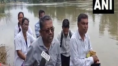 India News | Chhattisgarh: Health Team Crosses Swollen River to Set Up Camp in Bijapur Village