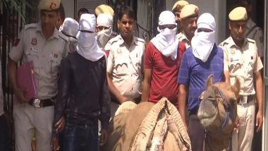 India News | Delhi Police Seizes 42 Cartons of Illicit Liquor, 3 Camels Recovered; 5 Held in Cross-border Operation