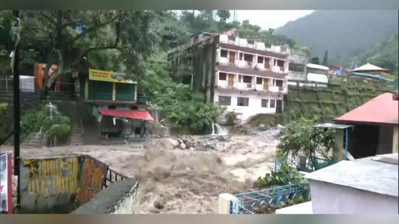 India News | Uttarakhand CM Dhami Monitors Relief Efforts as Heavy Rains Damage Shops in Dehradun's Sahastradhara