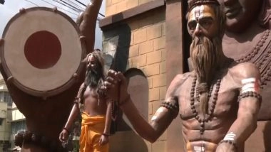 India News | North 24 Parganas' Agarpara Tarapukur Adi Sarvajanin Durga Puja Adopts 'Kumbh' Theme, Features Silicon Idol of Goddess Durga as Meditating Yogini