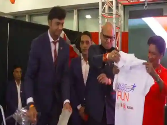 World News | Trinidad and Tobago PM Unveils Viksit Bharat Run T-shirt at Jaipur Foot USA Event