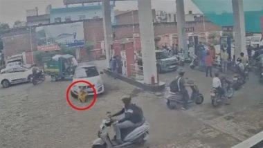 Agra: Woman Crushed to Death by Car at Petrol Pump While Waiting for Son to Refuel Motorcycle, CCTV Video Captures Harrowing Incident