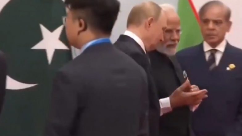 PM Narendra Modi and Russian President Vladimir Putin Walk Past Happily, Pakistan PM Shehbaz Sharif Appears Isolated As Both Leaders Engage in Conversation (Watch)