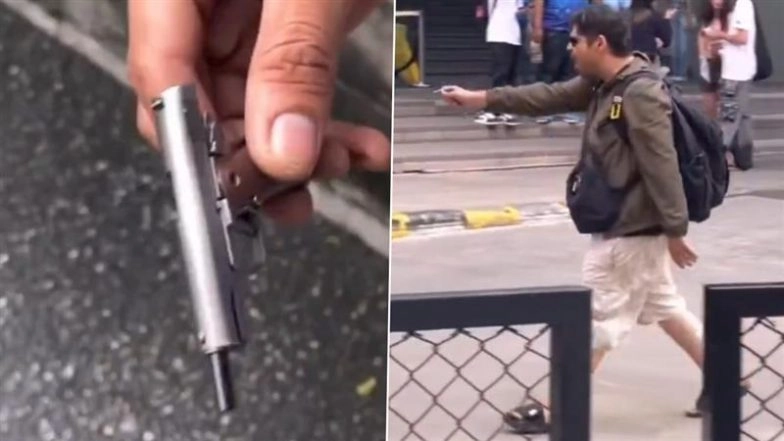 Indian Man Sahil Ram Thadani Causes Chaos in Bangkok’s Siam Square by Waving Gun-Shaped Lighter, Dancing in Streets and Shouting at People; Arrested (Watch Video)
