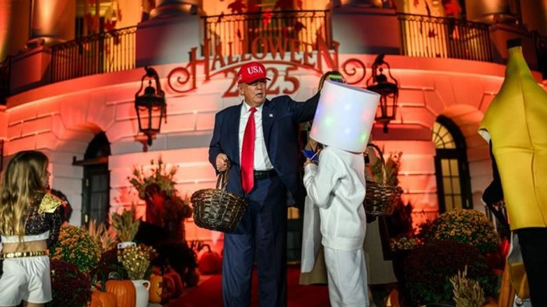 Donald Trump Recreates Viral Halloween Candy Moment of 2019, Places Candy Bar on Top of Child Wearing Marshmallow Helmet During Halloween Celebration at White House (Watch Video)