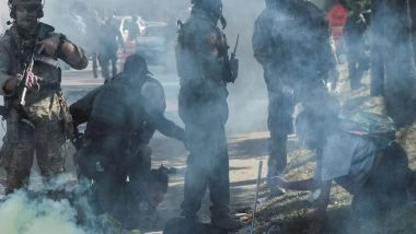 World News | US Federal Agents Shoot Woman After She Rammed Law Enforcement Vehicle