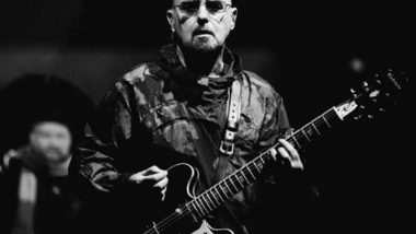 Entertainment News | Paul 'Bonehead' Arthurs Takes Break from Oasis Reunion Tour for Cancer Treatment