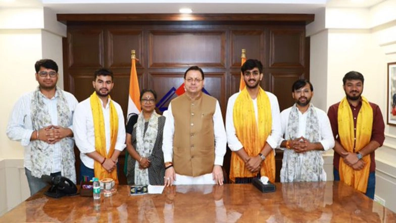India News | Uttarakhand CM Dhami Meets DUSU President and JNUSU Joint Secretary, Congratulates Them on Victory