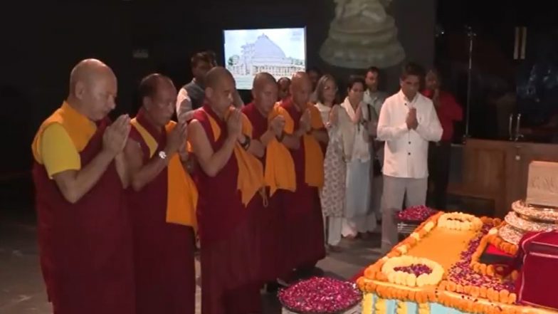 World News | Monks Offer Prayers to Sacred Buddha Relics Being Taken to Russia
