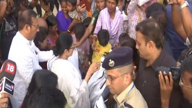 India News | W Bengal CM Mamata Banerjee Distributes Relief Materials in Alipurduar in Wake of Floods, Interact with Tea Garden Workers