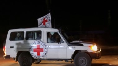 World News | Red Cross Vehicles Move in Gaza as Hamas Releases Names of 20 Hostages to Be Released Today