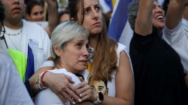 World News | First Seven Israeli Hostages Freed, Reunited with Families After Crossing into Israel