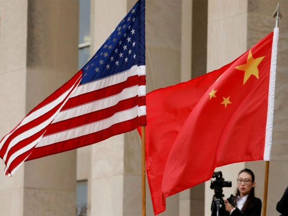 World News | US Lawmakers Call on White House to Press China over Detention and Exit-Ban Cases Involving American Citizens