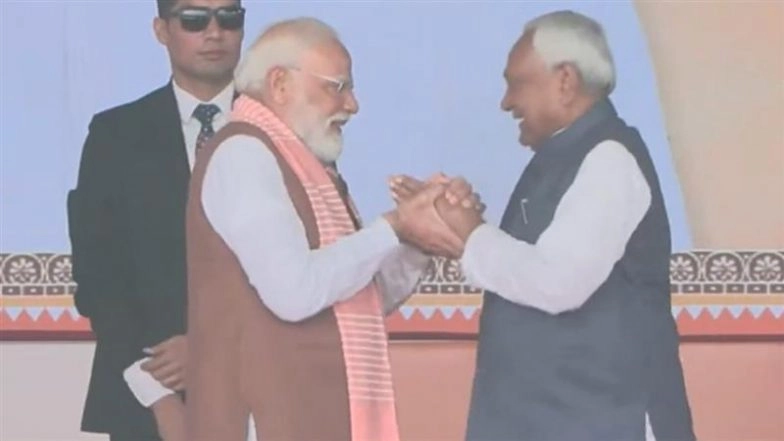 Bihar CM Oath-Taking Ceremony: PM Narendra Modi Holds Nitish Kumar’s Hands, Congratulates Him After 10th Swearing-In in Patna (Watch Video)