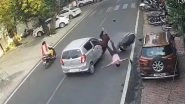 Jhansi Accident Caught on Camera: Speeding Car Overtakes Wrongly, Slams Into Scooter; Riders Thrown in Air in Shocking Hit-and-Run (Watch Video) Jhansi Accident Caught on Camera: Speeding Car Overtakes Wrongly, Slams Into Scooter; Riders Thrown in Air in Shocking Hit-and-Run (Watch Video)