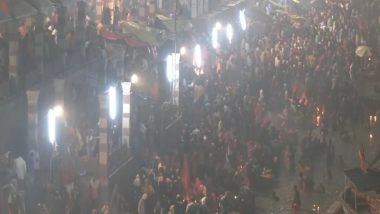 India News | UP: People Take a Holy Dip at Saryu Ghat During Kartik Poornima in Ayodhya