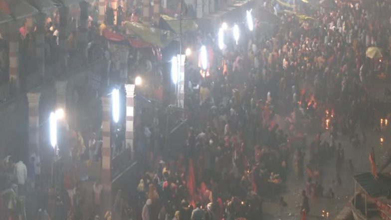 India News | UP: People Take a Holy Dip at Saryu Ghat During Kartik Poornima in Ayodhya