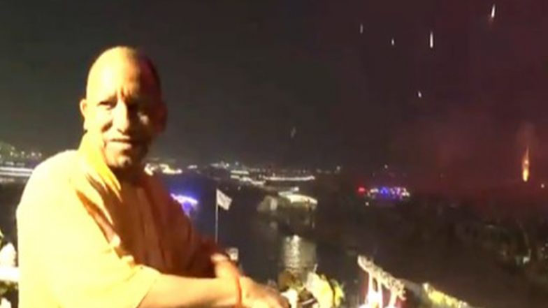 India News | UP CM Yogi Adityanath Attends Dev Deepawali Celebrations in Varanasi