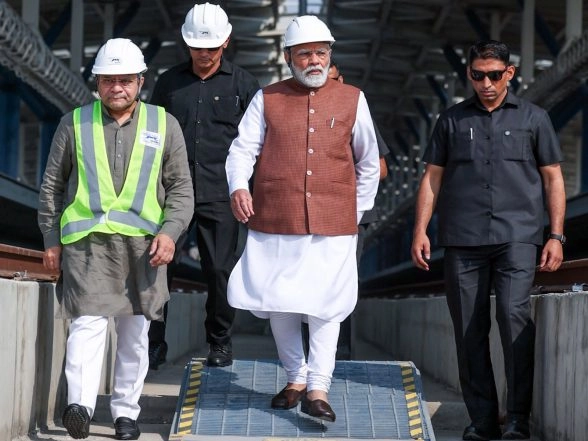 India News | PM Modi Visits Under-construction Surat Bullet Train Station in Gujarat; Reviews Progress of Mumbai-Ahmedabad High-Speed Rail Corridor