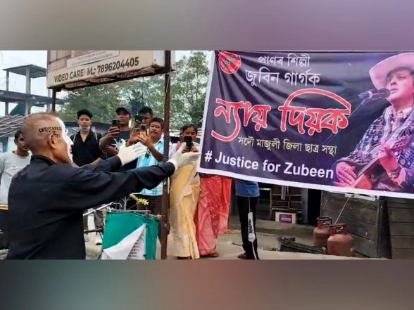 India News | Majuli Artist Uses Pantomime Art to Demand Justice for Zubeen Garg, Promotes Social Awareness
