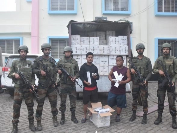 India News | Assam Rifles, DRI Siezes Large Consignment of Foriegn Cigarettes; 2 Held in Karimganj