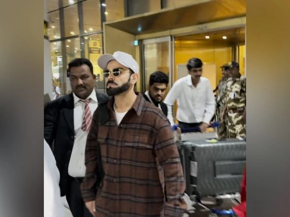 Entertainment News | Virat Kohli Spotted at Mumbai Airport; Playfully Engages with Paps, Poses for Photos