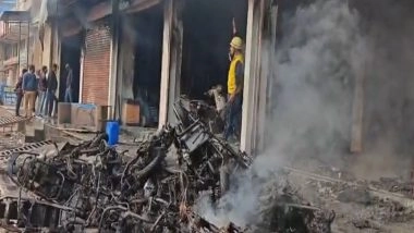 India News | Rajasthan: Fire Erupts at Kota EV Showroom; Electric Bikes Reduced to Ashes