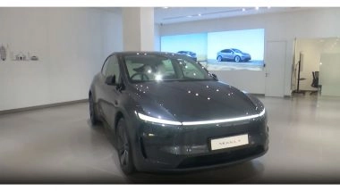 Business News | Tesla Opens First All-in-one Centre in Gurugram, to Offer Retail Sales, Services & Charging Facilities